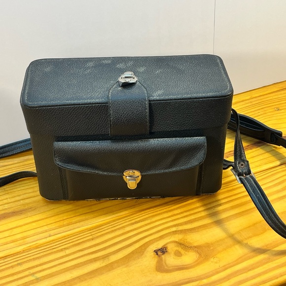 Yashica Black and Silver Film Camera with Rangefinder Design - Picture 2 of 12